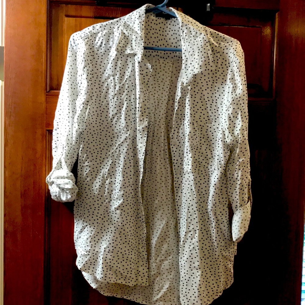 White button-down shirt with black hearts